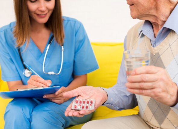medium-shot-old-man-holding-his-pills