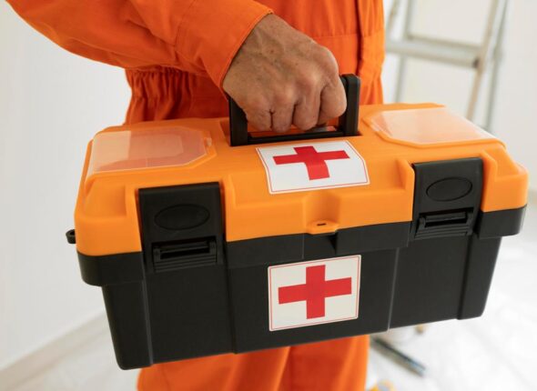 portrait-man-with-safety-protection-equipment-first-aid-kit